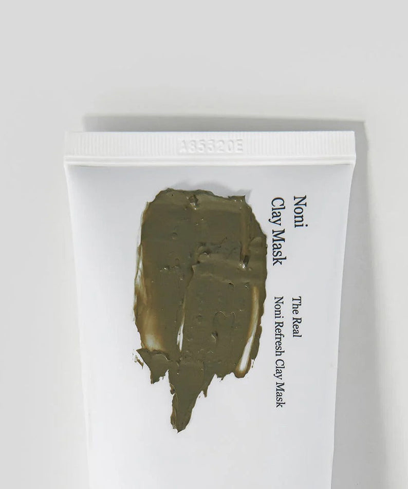 Packaging of CELIMAX The Real Noni Refresh Clay Mask 120g with clay applied to the tube.