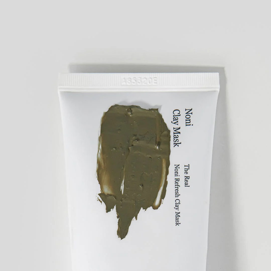 Packaging of CELIMAX The Real Noni Refresh Clay Mask 120g with clay applied to the tube.