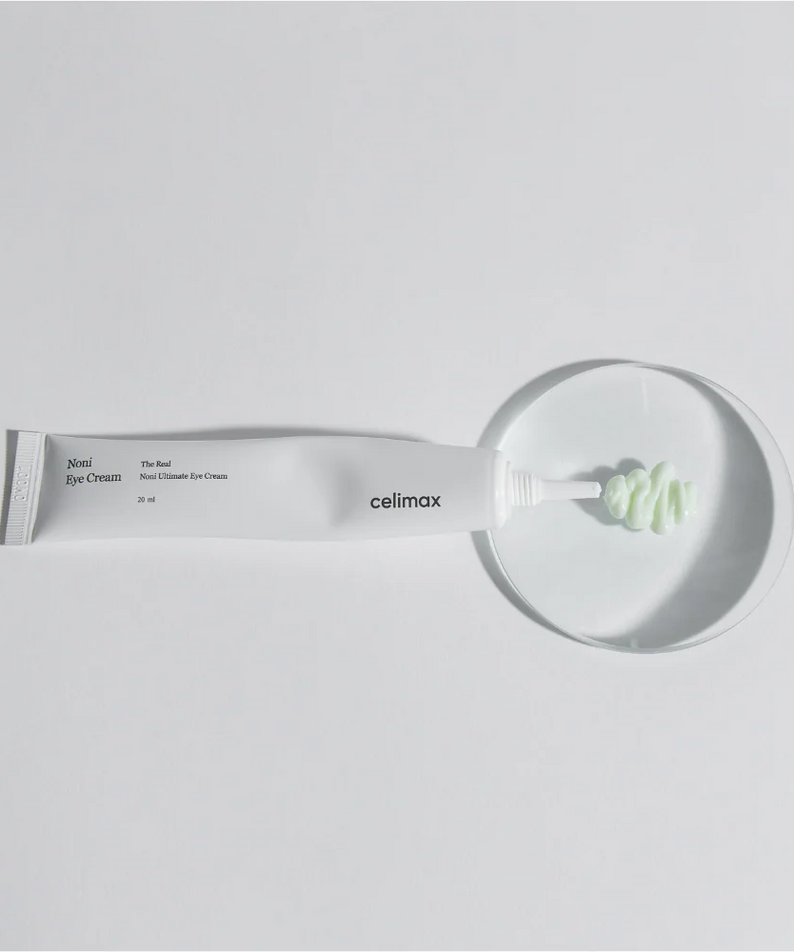 CELIMAX The Real Noni Ultimate Eye Cream 20ml tube with cream on display dish