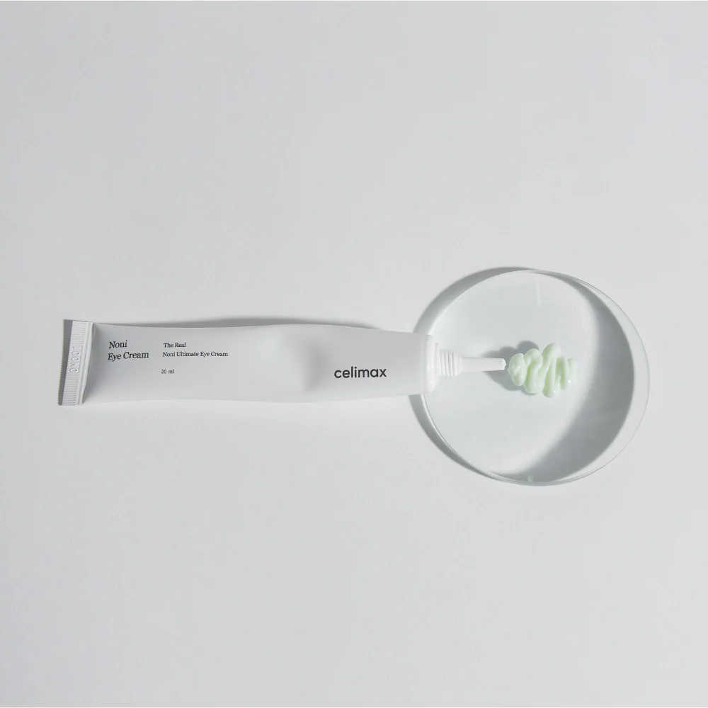 CELIMAX The Real Noni Ultimate Eye Cream 20ml tube with cream on display dish