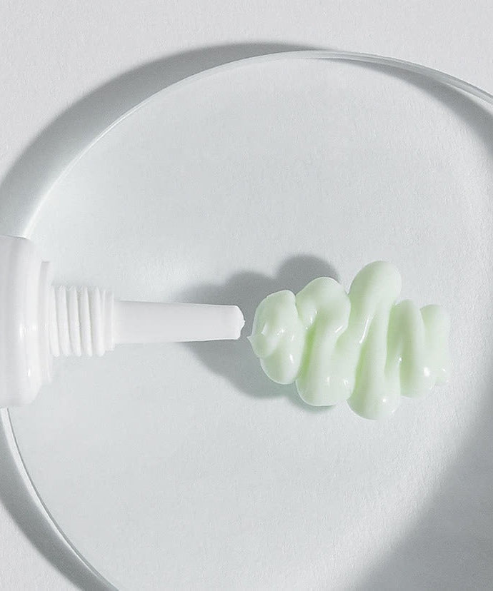CELIMAX The Real Noni Ultimate Eye Cream 20ml texture on clear plate