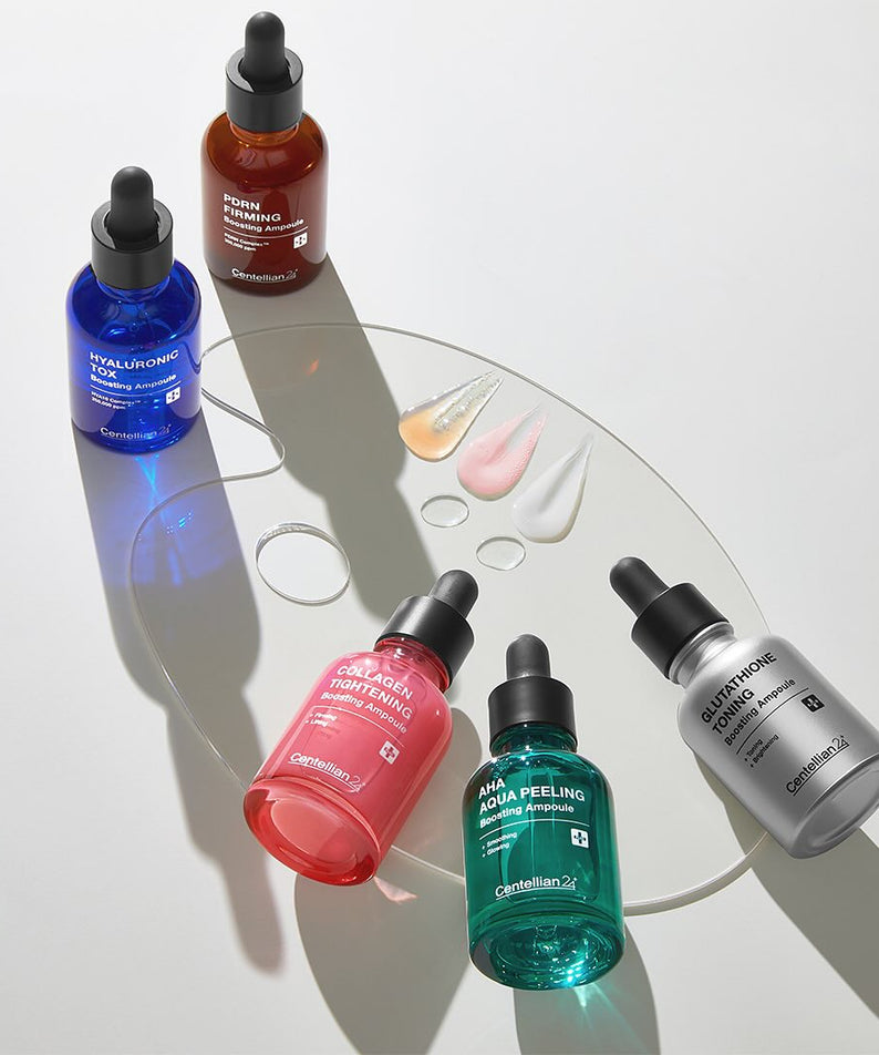 CENTELLIAN 24 Glutathione Toning Boosting Ampoule 30ml 5 Types arranged on a glass surface with colorful dropper bottles