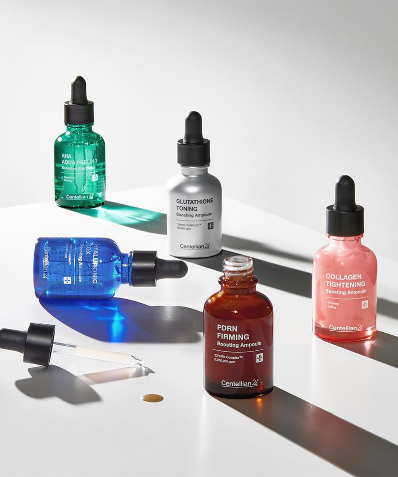 CENTELLIAN 24 Glutathione Toning Boosting Ampoule 30ml 5 Types displayed with dropper bottles on a white surface.