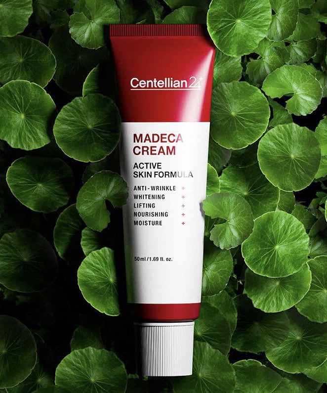 CENTELLIAN 24 Madeca Cream Active Skin Formula 50ml tube on green leaves background