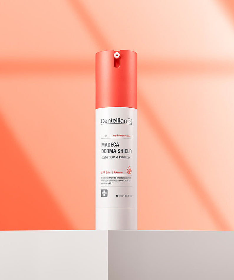 CENTELLIAN 24 Madeca Derma Sheild Safe Sun Essence 40ml product image on display with orange background.