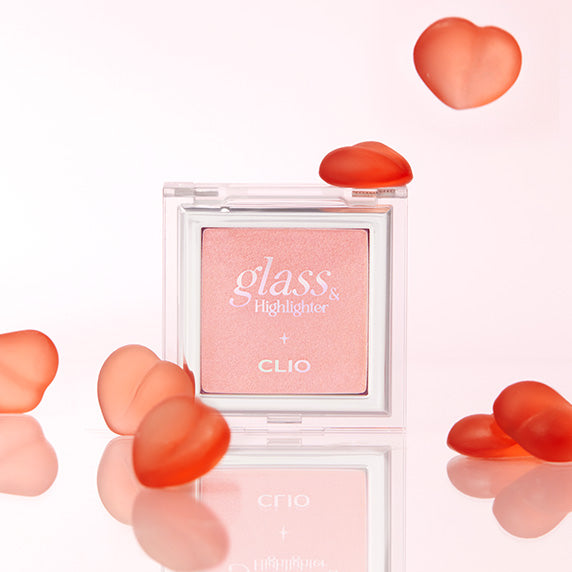 CLIO Glass & Highlighter [New Color Release] makeup compact with heart decorations on a soft pink background.