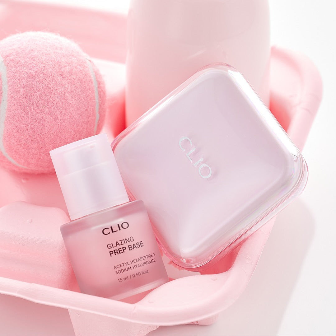 CLIO Glazing Prep Base 40ml cosmetic bottle and pink packaging in a stylish setting.