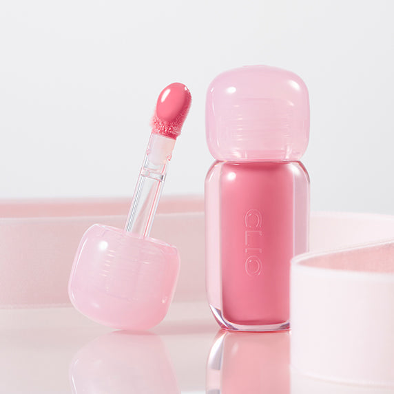 CLIO Volume Mate Blur Tint/Gloss in elegant pink packaging, showcasing vibrant pink shade for enhanced lip volume and blur effect.