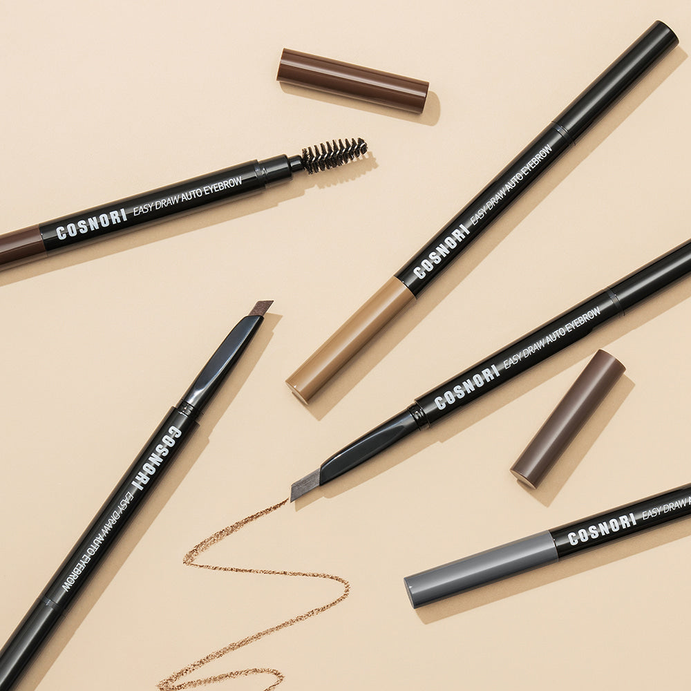 COSNORI Easy Draw Auto Eyebrow pencils in various shades with caps off and pencil tips visible on a beige background.