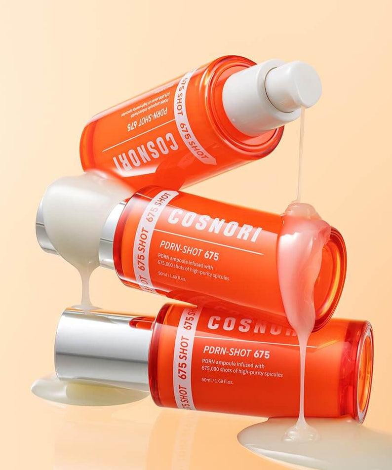 COSNORI PDRN Shot 675 50ml bottles with skincare serum pouring out, showcasing the product's texture and packaging.