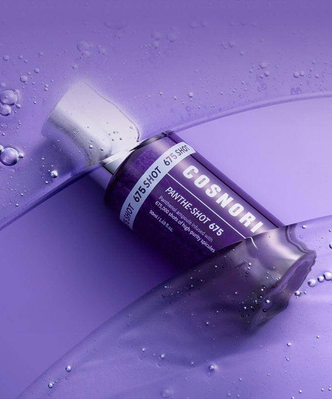 COSNORI Panthe-Shot 675 50ml bottle on a purple water-inspired background, highlighting skincare product design and branding.