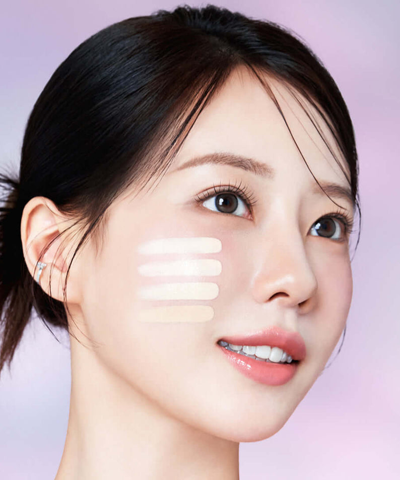 Model applying COSNORI Panthenol Barrier Cushion SPF50+PA++++ showing skin application on face