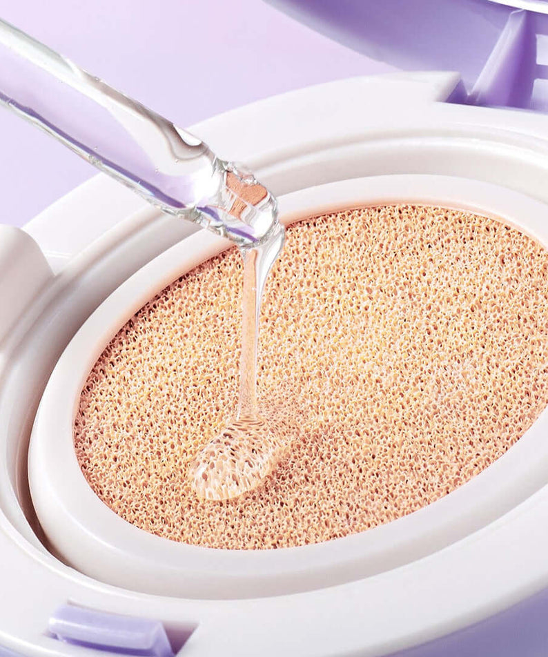 COSNORI Panthenol Barrier Cushion SPF50+PA++++ with liquid being applied to cushion surface