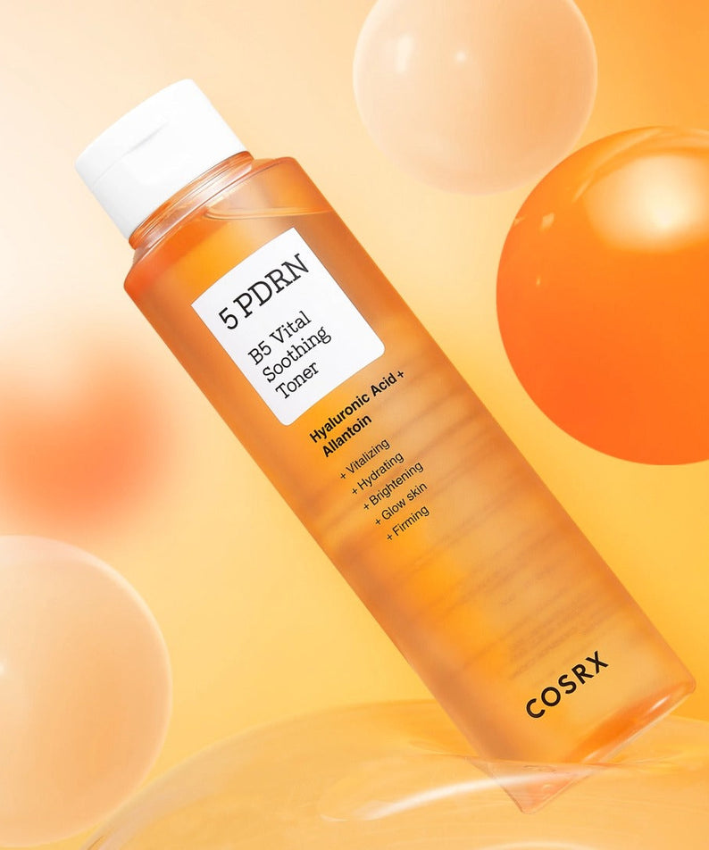 COSRX 5 PDRN B5 Vital Soothing Toner with Hyaluronic Acid and Allantoin, 100ml product bottle image with orange bubbles.
