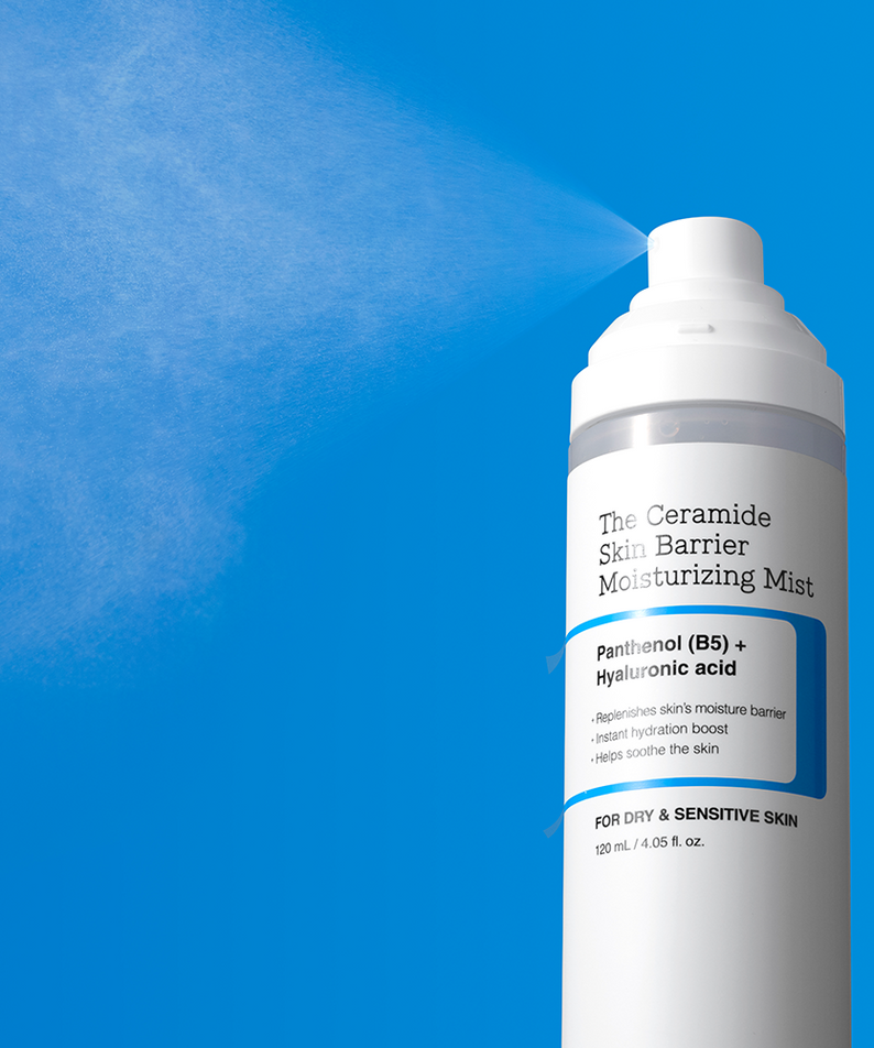 COSRX The Ceramide Skin Barrier Moisturizing Mist 120ml spray bottle on a blue background.
