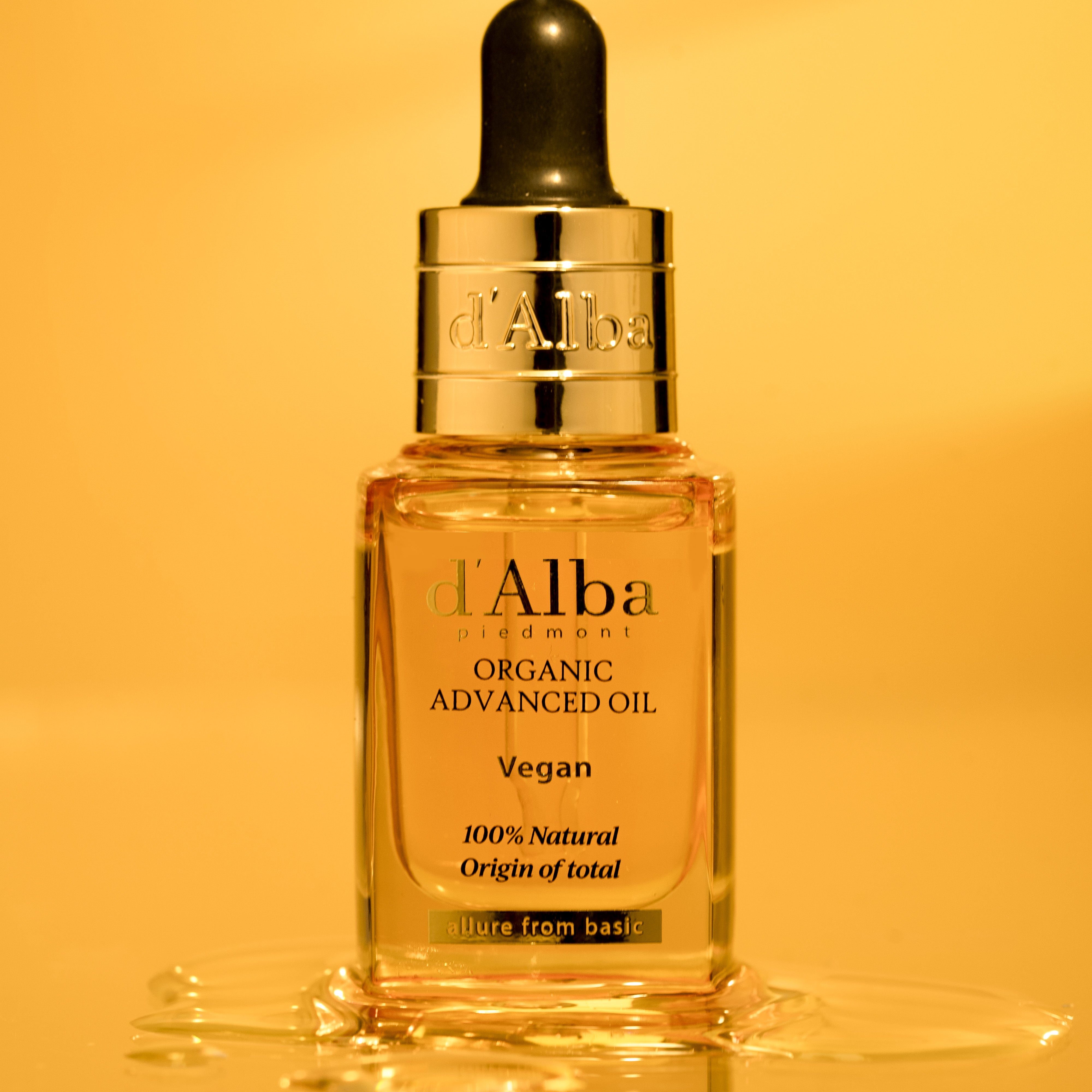 D'ALBA Organic Advanced Oil 17ml bottle with dropper on amber background