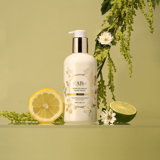 D'ALBA Scented Mood Hand Wash 290ml bottle with floral and citrus arrangement, promoting refreshing and aromatic hand care experience.