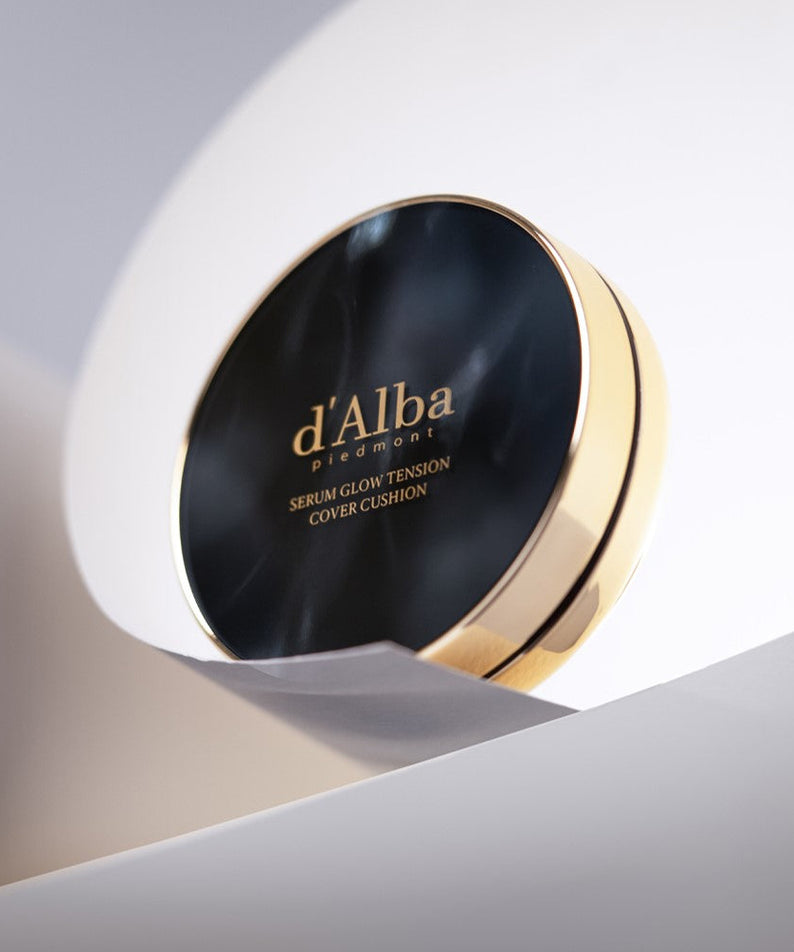 D'ALBA Serum Glow Tension Cover Cushion compact showcasing sleek packaging design.