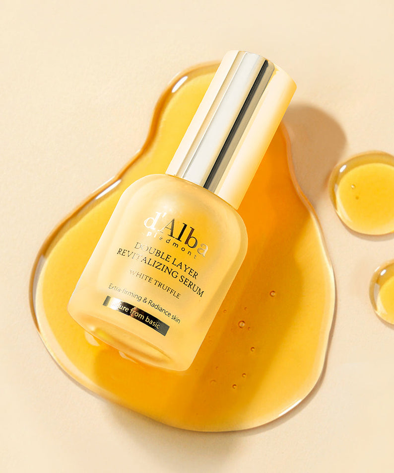 D'ALBA Vegan Double Serum 30ml bottle displayed on a background with golden liquid drops
