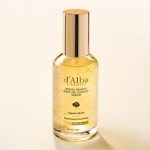 D'ALBA Vegan First Oil Capsule Serum 100ml bottle with gold cap on a neutral background.