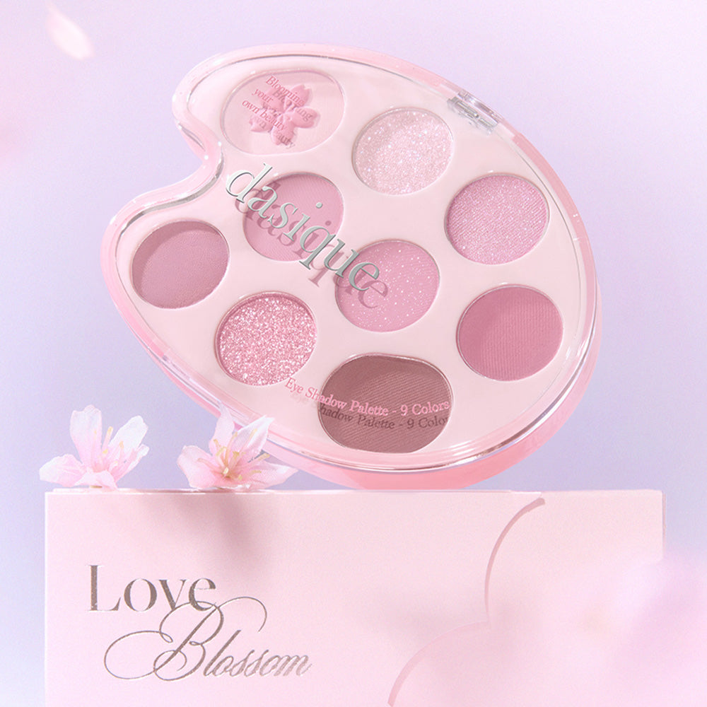 DASIQUE Pink Blossom Shadow Palette featuring 9 dazzling pink shades, displayed elegantly on a floral background.