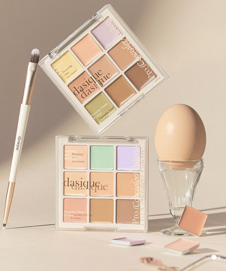 DASIQUE Pro (Concealer) Palette with makeup brush and color correctors, enhancing complexion balance and coverage.