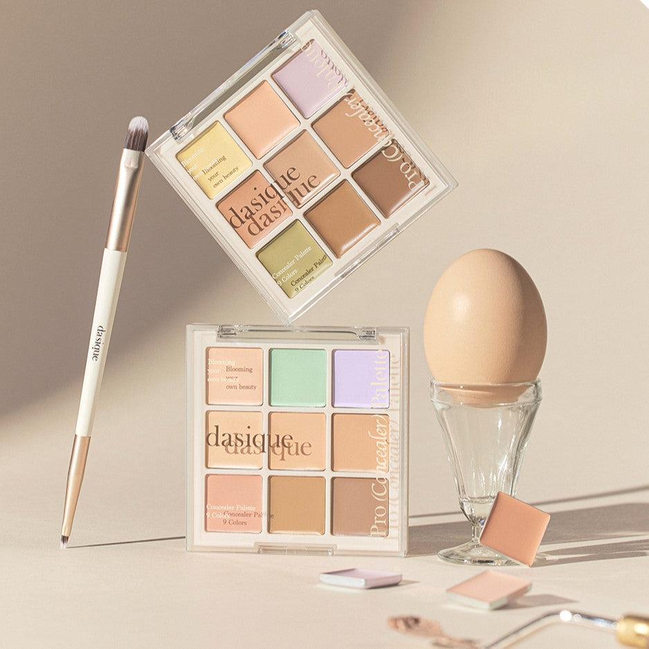 DASIQUE Pro (Concealer) Palette with makeup brush and color correctors, enhancing complexion balance and coverage.