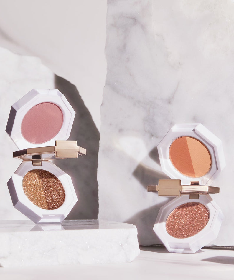 DEAR DAHLIA Paradise Dual Palette showcasing versatile shades in an elegant setting with marble background.