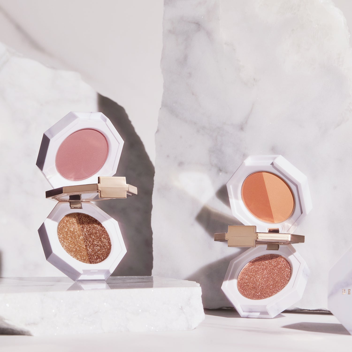 DEAR DAHLIA Paradise Dual Palette showcasing versatile shades in an elegant setting with marble background.