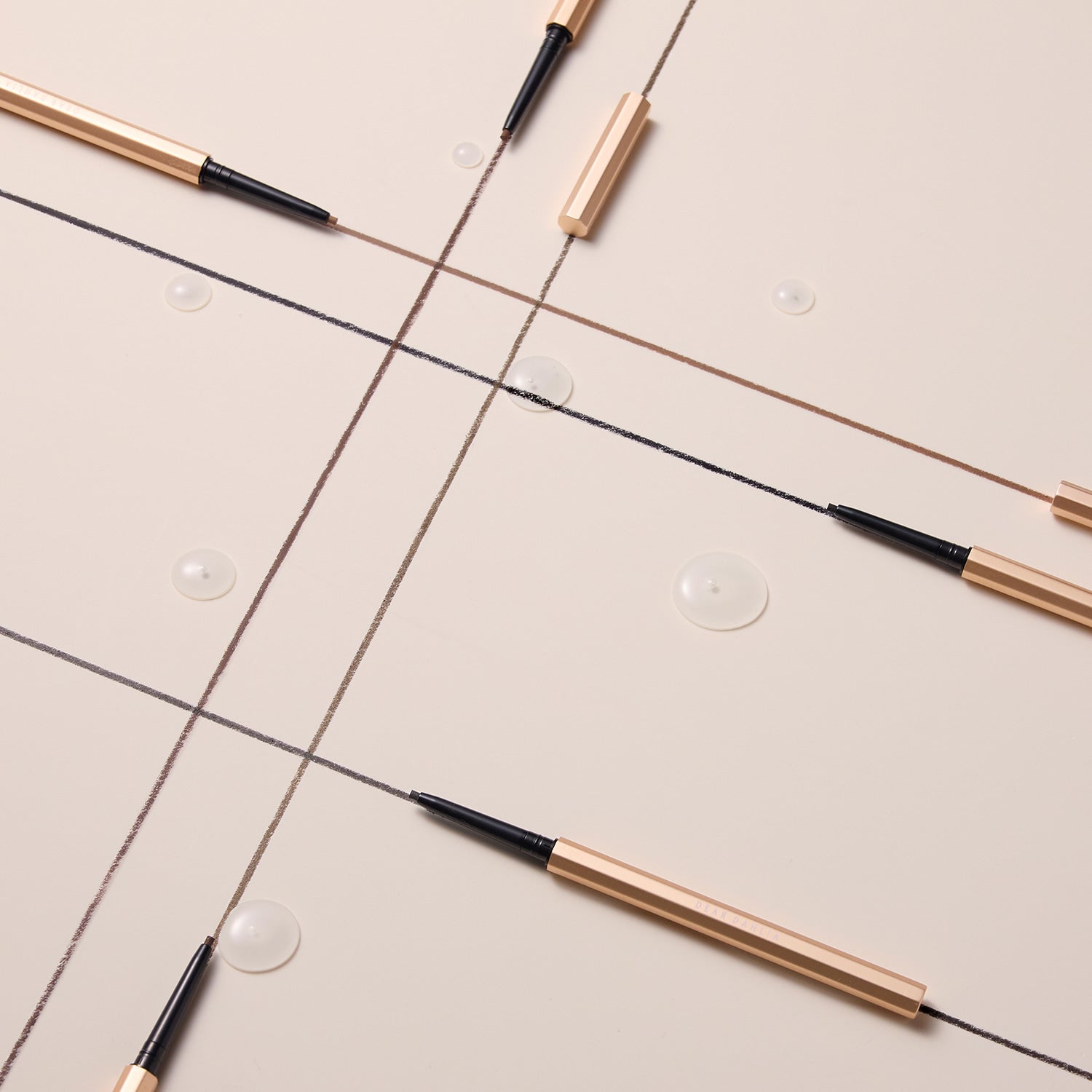 DEAR DAHLIA Perfect Desighning Eyeliner Pencil lying on a neutral background.