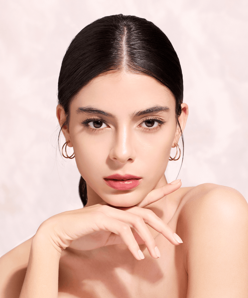 Model showcasing flawless skin using DEAR DAHLIA Skin Silhouette Contour Dou, emphasizing natural and radiant beauty.