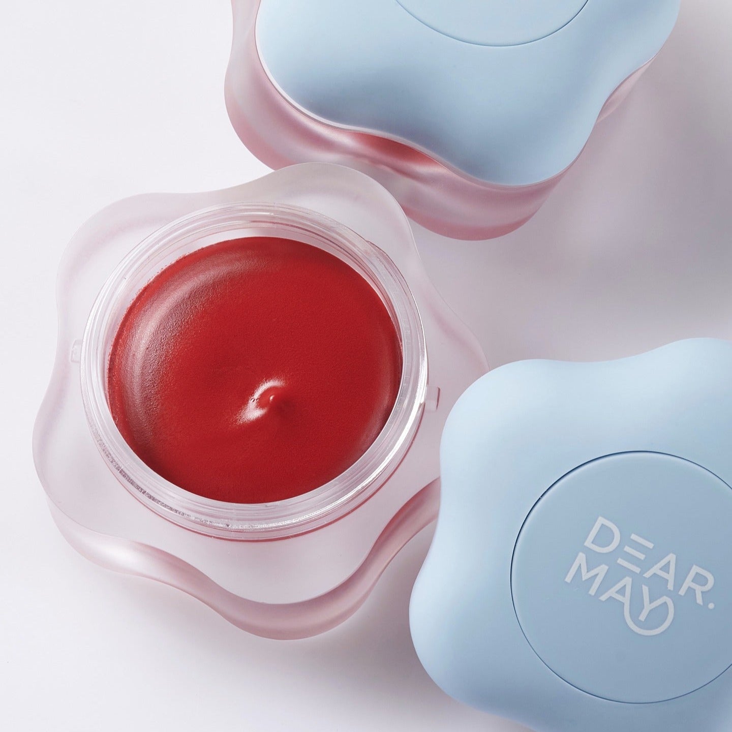 DEAR MAY Pure Falling Mood Lip Pot 6.5g in open and closed pots with vibrant red lip color.