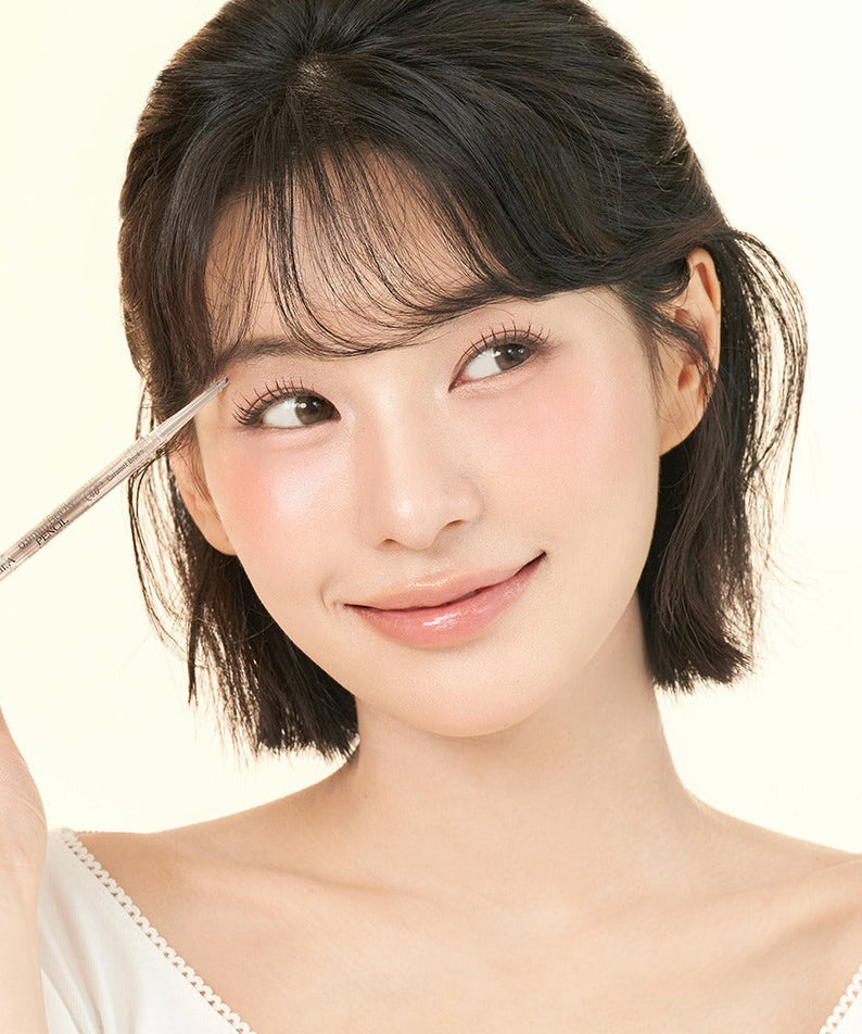 Woman using DEAR.A 0.9mm Eyebrow pencil for precise eyebrow definition