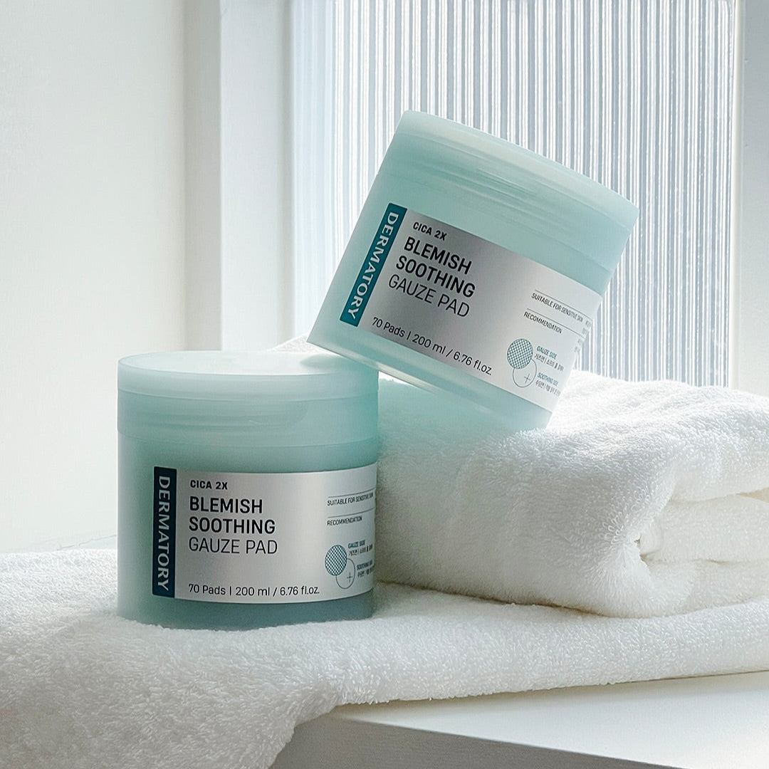 DERMATORY Cica Exosome Blemish Soothing Gauze Pad 70 Pads displayed on a towel with natural light.
