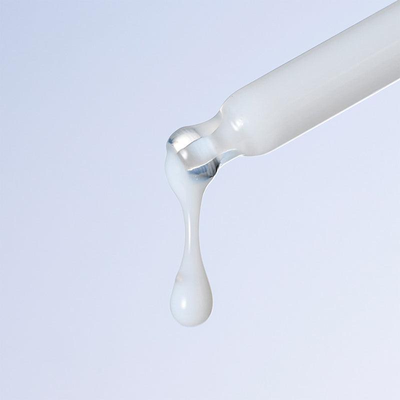 Dropper dispensing DERMATORY Hyal Shot Barrier Cream Ampoule B5 50ml onto surface
