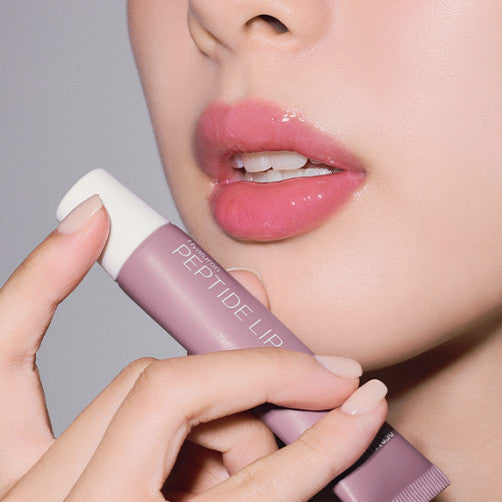 Close-up of lips with DERMATORY Hyaluronic Peptide Lip Keyring for moisturizing