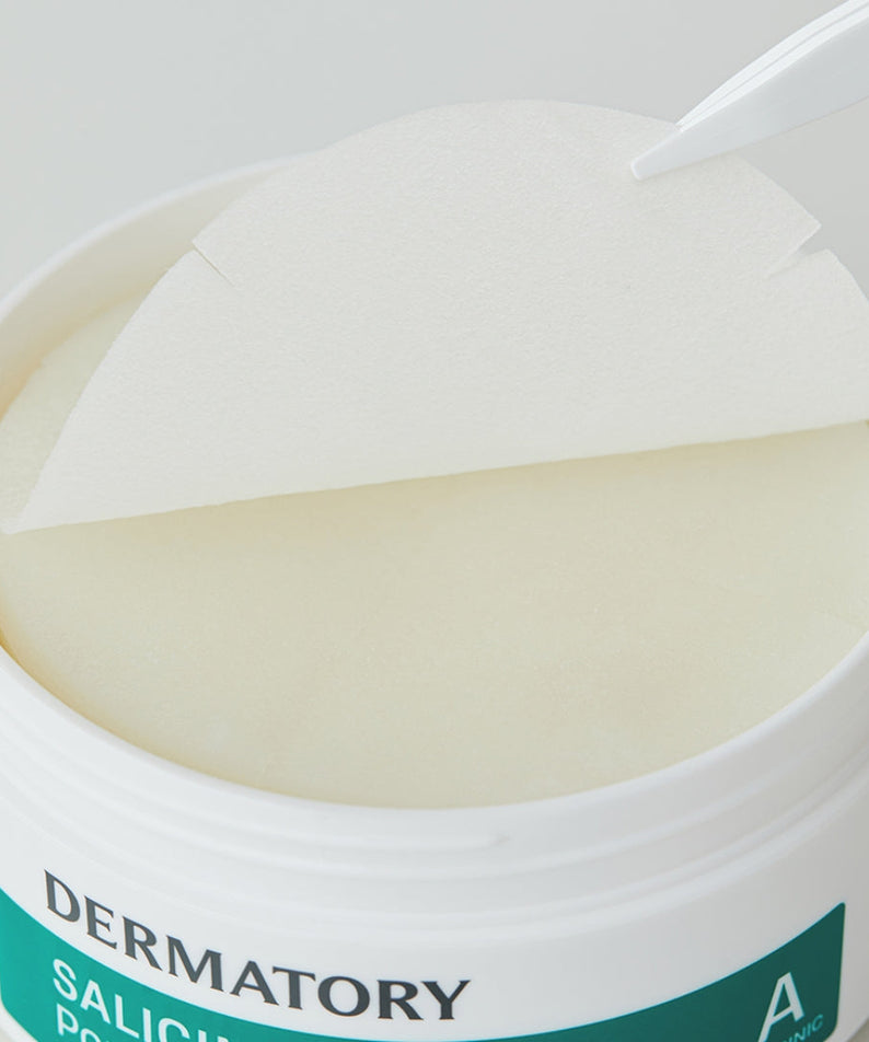Open container of DERMATORY Salicinic Pore Trouble Melting Pad 30 Sheets with tweezers lifting a pad