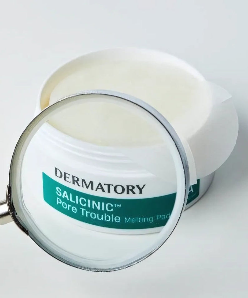 DERMATORY Salicinic Pore Trouble Melting Pad 30 Sheets in a jar with a magnifying glass highlighting the label.
