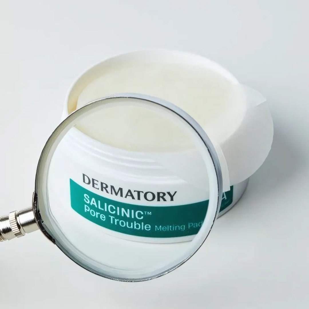 DERMATORY Salicinic Pore Trouble Melting Pad 30 Sheets in a jar with a magnifying glass highlighting the label.