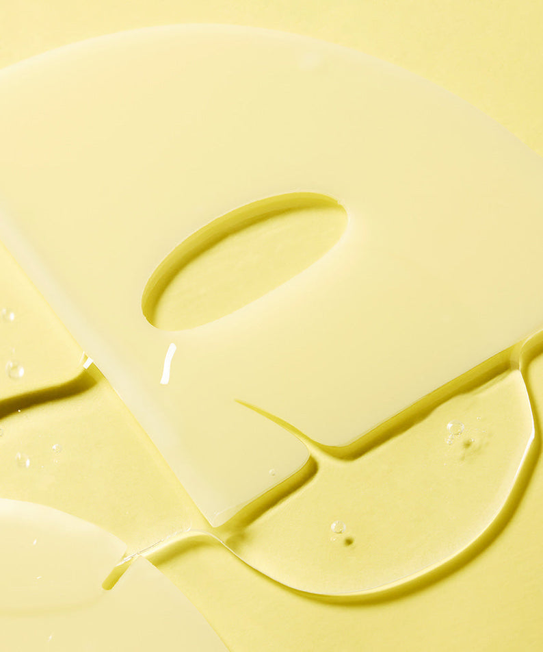 Close-up of DEWYTREE AC Deep Skin Clarity Collagen Gel Mask 4 Sheets texture on yellow background