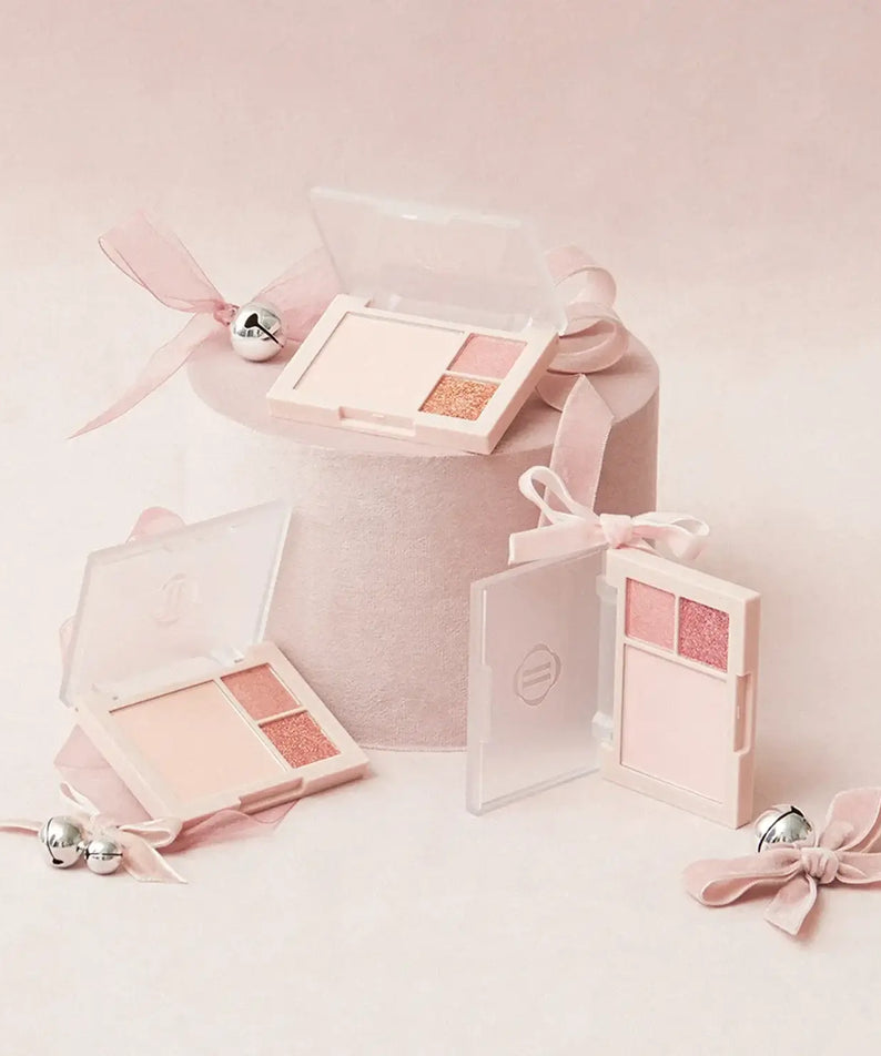 DINTO Cheek & Eye Multi-Use Palette in pink hues with ribbon decor