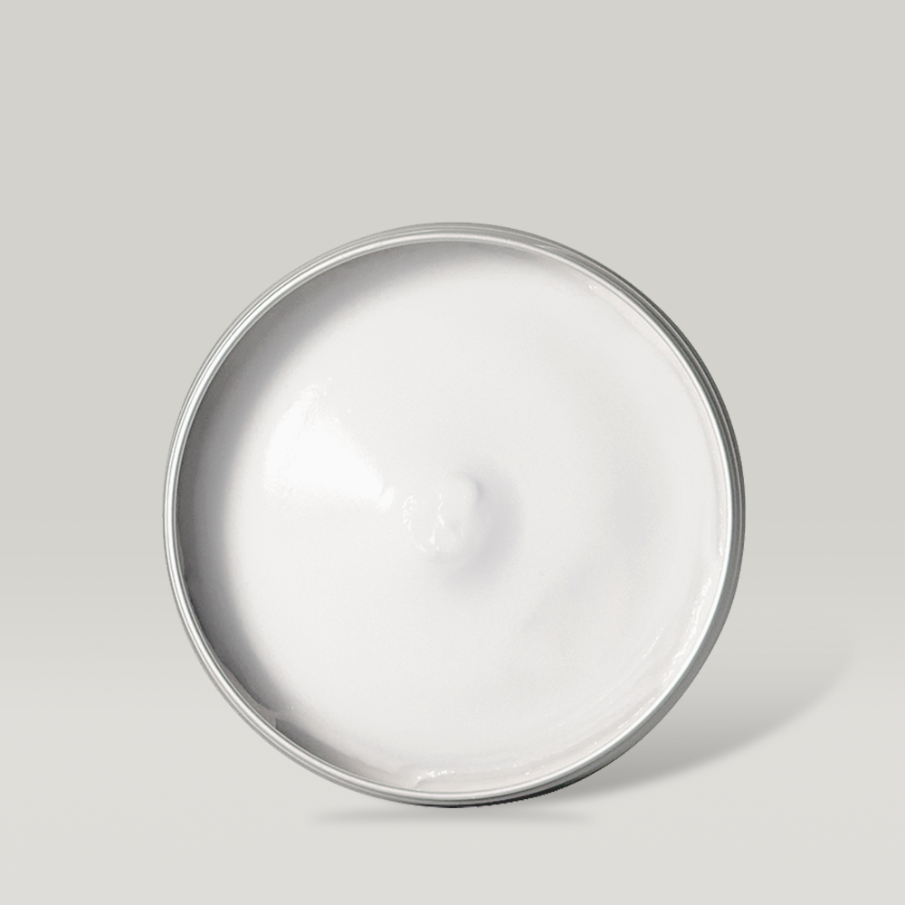 Top view of DONGGUBAT Correct Hand Cream Shea Butter in a silver tin container.