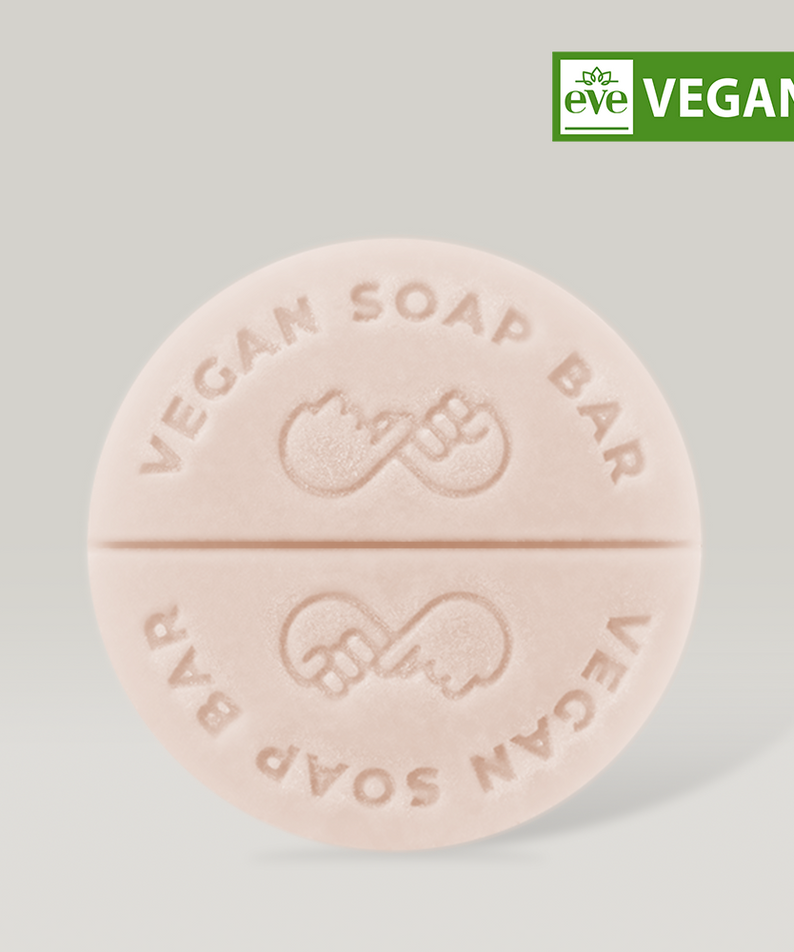 DONGGUBAT Vegan Treatment Bar Dongbaek with embossed vegan logo, eco-friendly packaging, and certified vegan label.