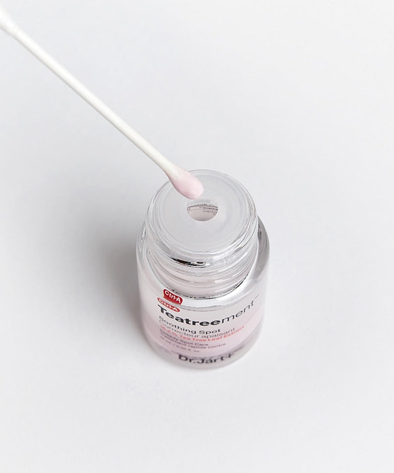 Close-up of DR. JART+ Ctrl-A Teatreement Soothing Spot 15ml jar with cotton swab