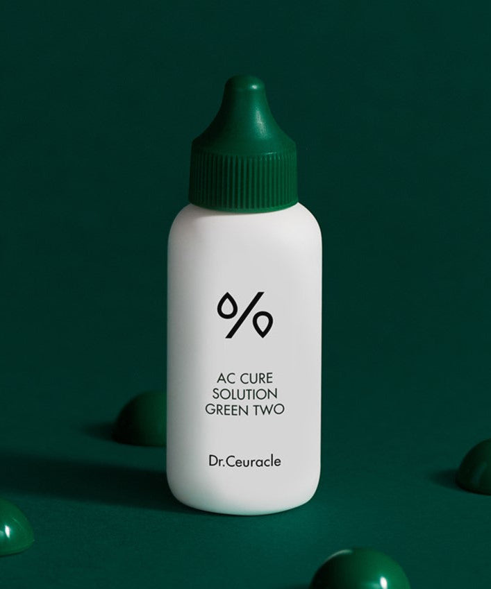 DR.CEURACLE AC Cure Solution Green Two 50ml bottle on dark green background