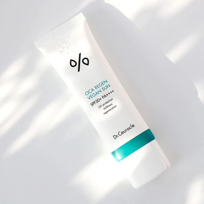Dr.Ceuracle Cica Regen Vegan Sun SPF50+ PA++++ 50ml in sunlight, highlighting the product's packaging and design.