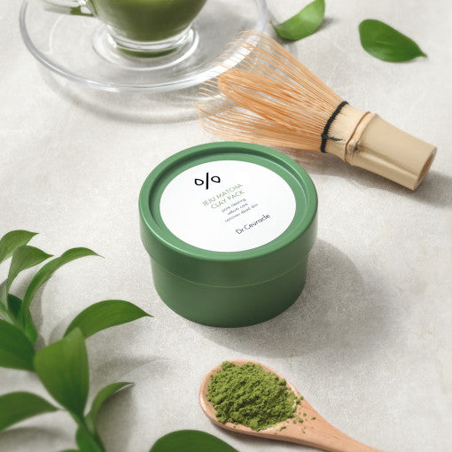 DR.CEURACLE Jeju Match Clay Pack 115g with traditional matcha tools and green leaves background.