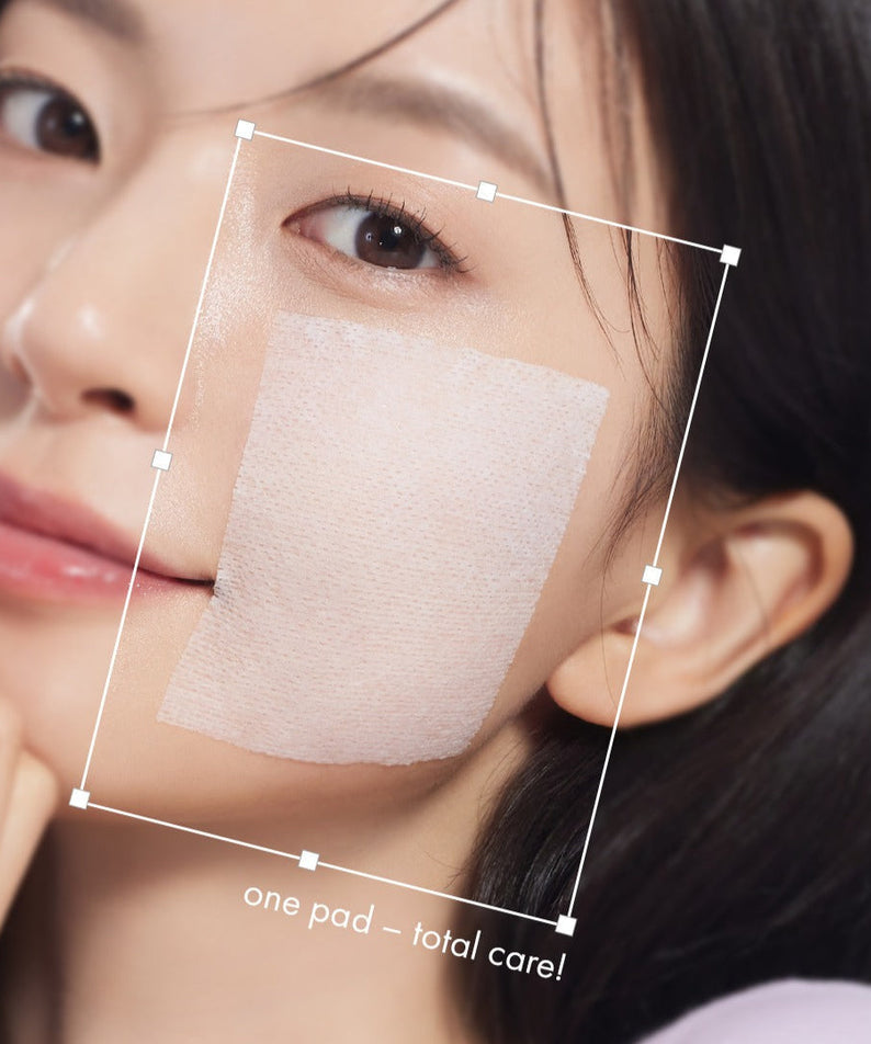 Close-up of a woman's face with DR.CEURACLE PLC Calming Solution Pad 130 pads, highlighting skincare benefits.