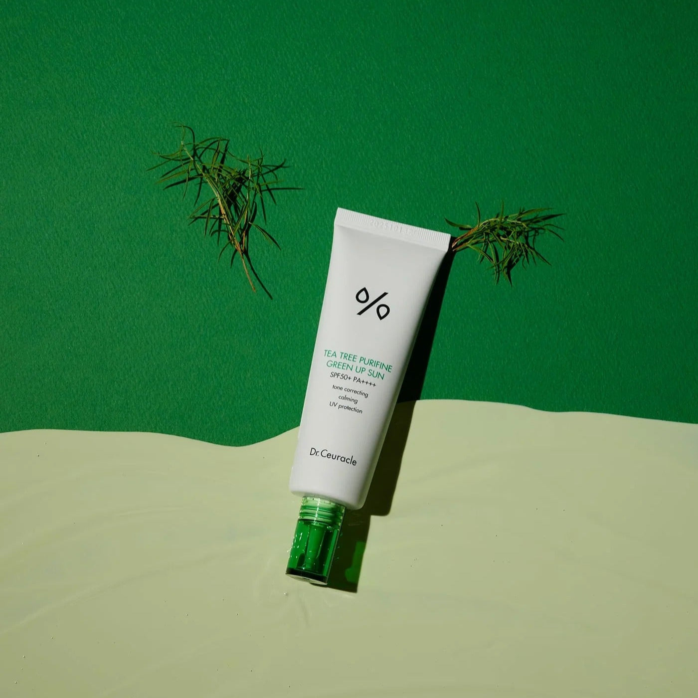 DR.CEURACLE Tea Tree Purifine Green Sup Sun 50ml tube with green background