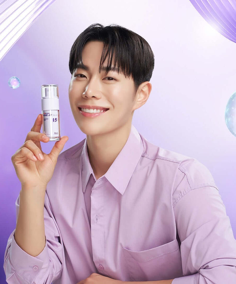 Person holding DR.G Bakuchiol Porejet Serum with pastel background for skincare campaign.